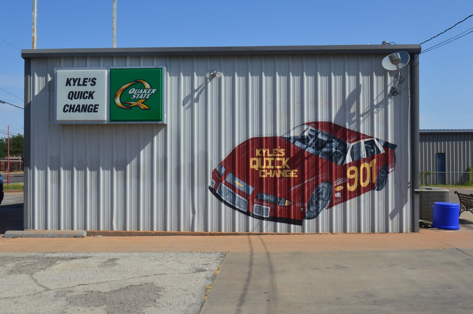 Kyle's Quick Change shop exterior side view showing building and signage